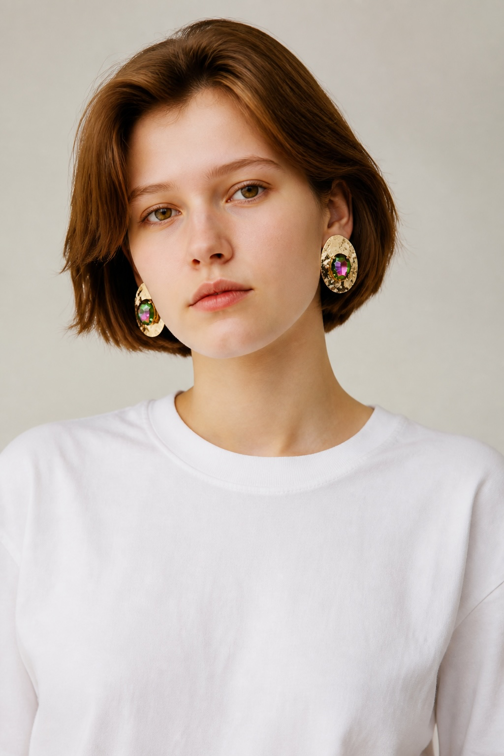 Gold oil sick statement earrings