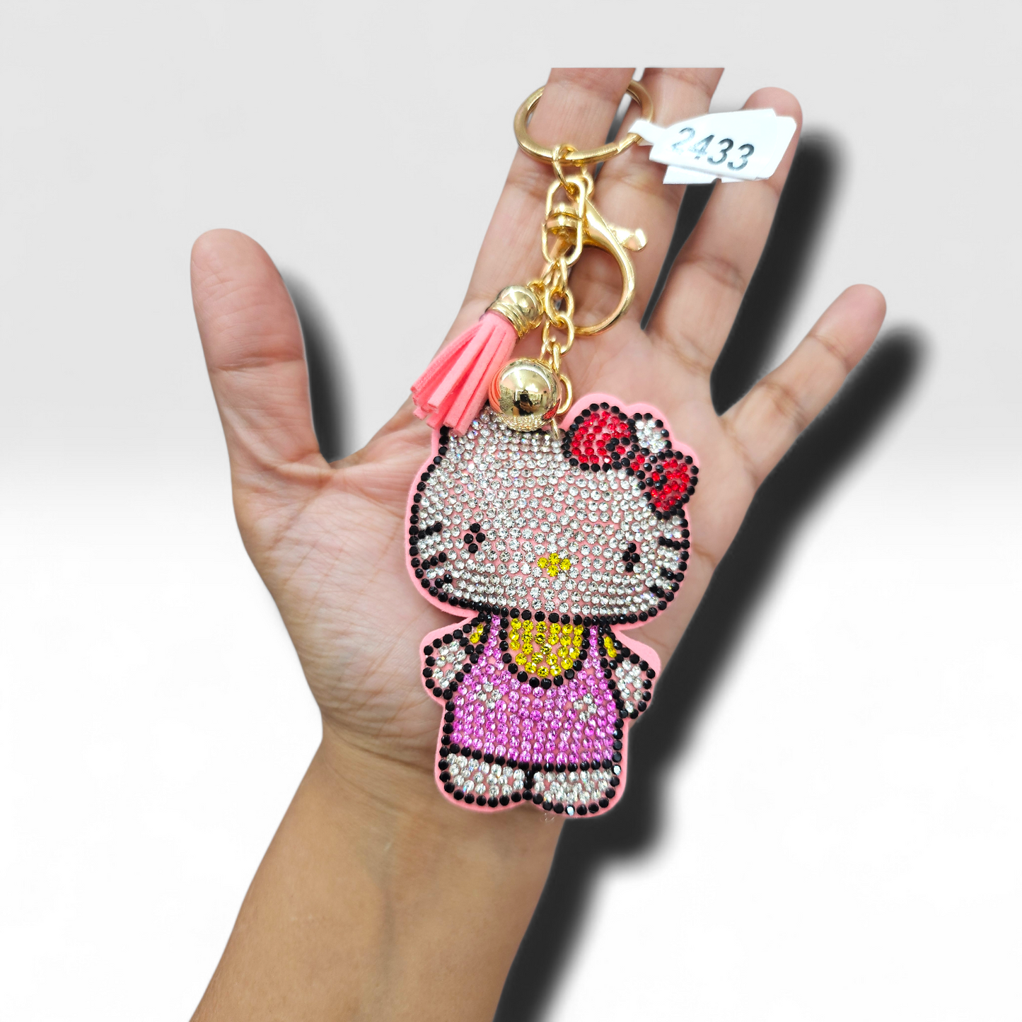 HK pink overall keychain